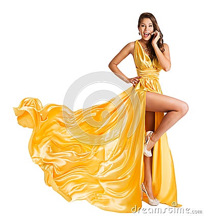 Woman Yellow Dress Flying on Wind, Beautiful Fashion Model in Fluttering Gown on white Stock Photo