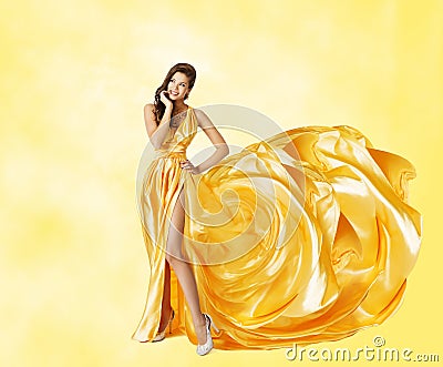 Woman Yellow Dress, Happy Fashion Model in Elegant Long Gown Stock Photo