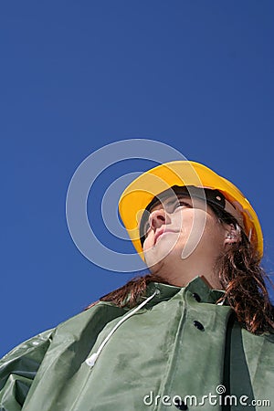 Woman with yellow helmet Stock Photo