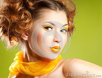 Woman with yellow make-up Stock Photo