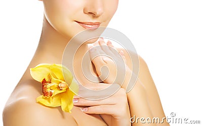 Woman with yellow orchid Stock Photo