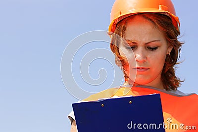 Woman with yellow safety helme Stock Photo