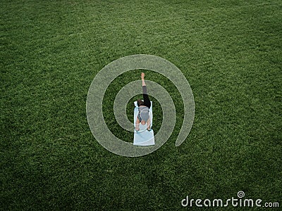 Woman Yoga Aerial Stock Photo