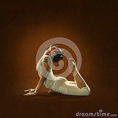 Woman in yoga position. Hamsa Stock Photo