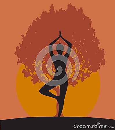 Woman in Yoga tree pose Stock Photo