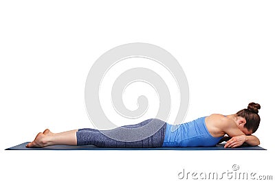 Womand relax in Hatha yoga asana Makarasana Stock Photo