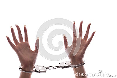 Womans hands in iron handcuffs Stock Photo