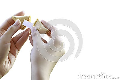 Womans Hands Open a Fortune Cookie Stock Photo