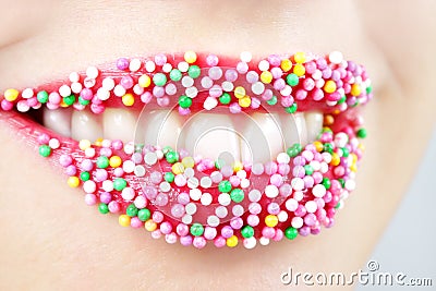 Womans lips with candy Stock Photo