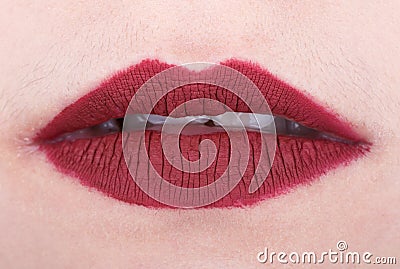 Womans lips with red glossy lipstick Stock Photo