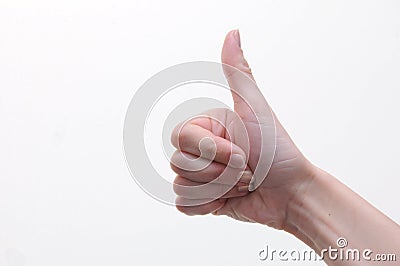 Womans thumb up Stock Photo