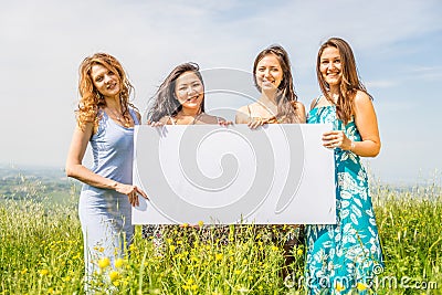 Women with advertising board Stock Photo