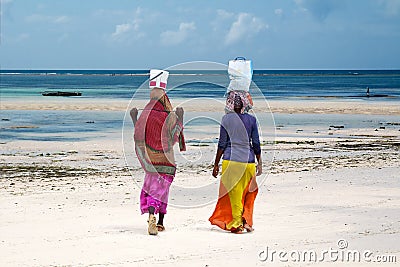Women at the beach, Zanzibar island, Tanzania Stock Photo