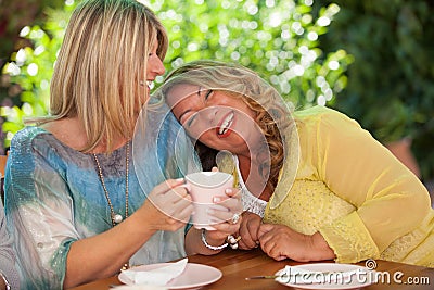 Women, best friends laughing Stock Photo