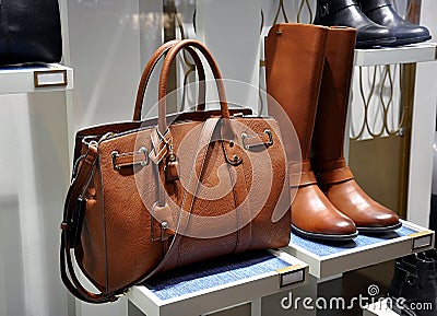 Women brown boots and leather bag Stock Photo