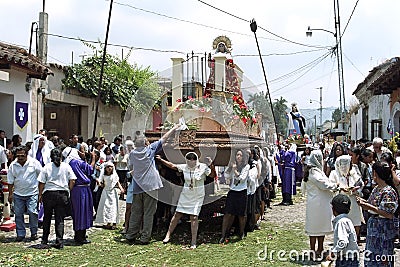 Women carrying shrine during Holy Week procession Editorial Stock Photo