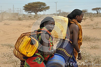 Women carrying water in Ethiopia Editorial Stock Photo