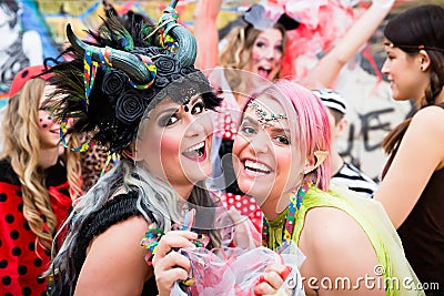 Women celebrating German Fasching Carnival in costumes Stock Photo