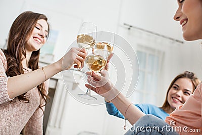 Women cheering with wine Stock Photo