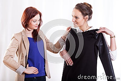 Women choosing clothes together Stock Photo