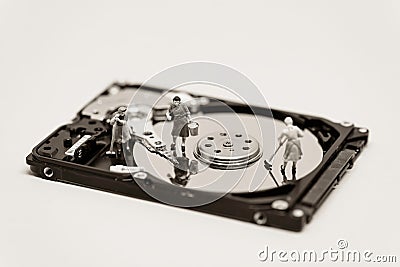 Women clean up a hard drive. Technology concept. Macro photo