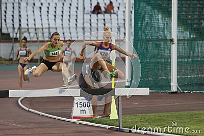 Women competitors at 3000m steeplechase Editorial Stock Photo