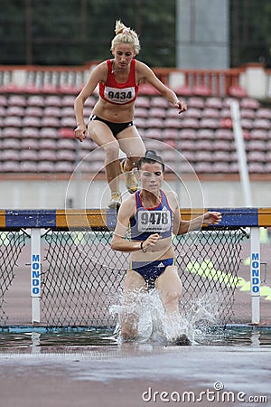 Women competitors at 3000m steeplechase Editorial Stock Photo