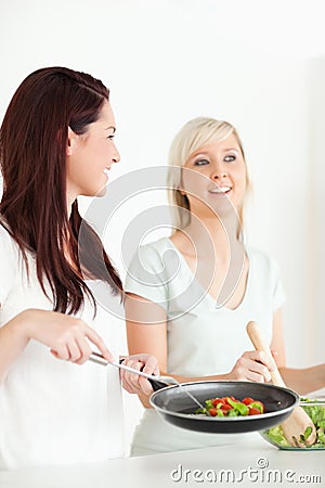 Women cooking dinner Stock Photo