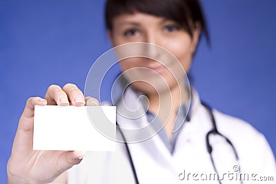 Women Doctor holding blank card Stock Photo