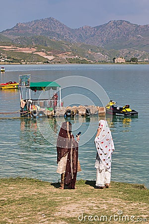 Women enjoying the view of the lake Editorial Stock Photo