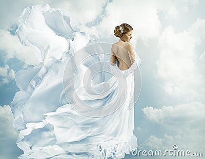 Women Fantasy Flying Gown, Waving Dress Blowing on Wind Stock Photo