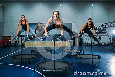 Women group on sport trampoline, fitness workout Stock Photo