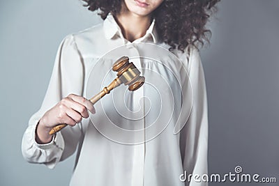 Women hand wooden judge Stock Photo