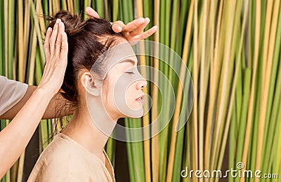 Women is having head massage relaxation Stock Photo