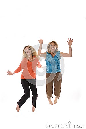 Women jumping Stock Photo