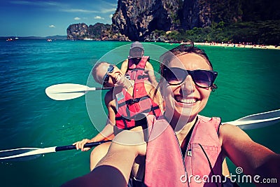 Women are kayaking in the open sea at the Krabi shore, Thailand Stock Photo