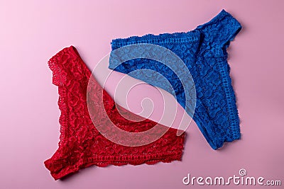 Women lace silk panties on pink background Stock Photo