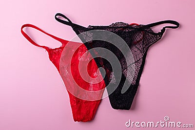 Women lace silk panties on pink background Stock Photo