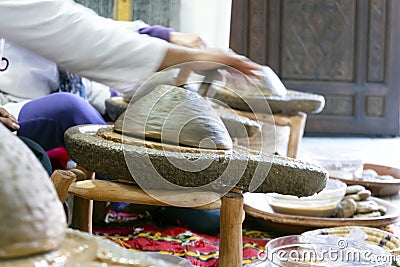 Women making argan oil in Marrakech, Morocco Stock Photo