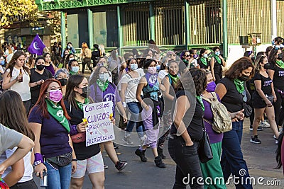 Women marching at International Women's Day 8M - Santiago, Chile - Mar 08, 2022 Editorial Stock Photo