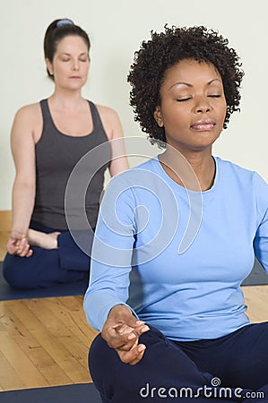 Women Meditating Stock Photo