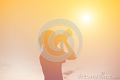 Women Nature photographer with digital camera on the mountain Stock Photo