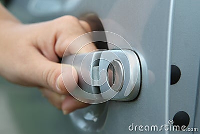 Women open shes car Stock Photo