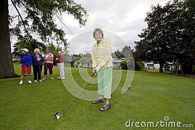 Women Playing Golf Stock Photo