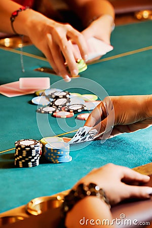 Women playing poker Stock Photo