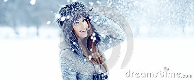Women playing with snow in park Stock Photo