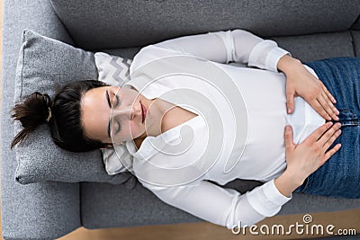 Women PMS Stomach Pain Stock Photo
