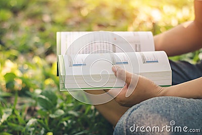 Women read holiday book in nature quiet environment Stock Photo