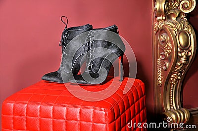 Women`s ankle boots handmade. Imitation brand shoes Editorial Stock Photo