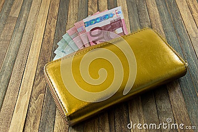 Women`s money purse with gold color Stock Photo